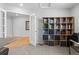 Bright office space with open bookshelves and ample natural light at 6185 Saddle Bow Ave, Parker, CO 80134