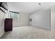 Finished basement with a Murphy bed, built-in storage, and a large window for natural light at 4235 Lark Sparrow St, Highlands Ranch, CO 80126
