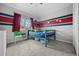 bedroom with airplane-themed accent wall and cozy carpet flooring at 4235 Lark Sparrow St, Highlands Ranch, CO 80126