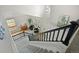 Inviting entryway featuring stairs, hardwood floors, and bright natural light at 4235 Lark Sparrow St, Highlands Ranch, CO 80126