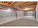 Unfinished basement with exposed beams at 4961 Aspen Creek Dr, Broomfield, CO 80023