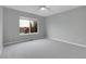 This updated bedroom features a neutral color palette, a ceiling fan and bright, natural light at 4961 Aspen Creek Dr, Broomfield, CO 80023