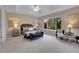Spacious main bedroom featuring plush carpet, a trey ceiling, and large windows with scenic views at 4961 Aspen Creek Dr, Broomfield, CO 80023