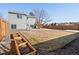 Large backyard with a deck/stairs, new fence, and room to entertain at 17990 E Cornell Dr, Aurora, CO 80013