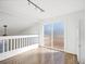 Bright living room with hardwood floors and sliding glass door that provides natural light at 17990 E Cornell Dr, Aurora, CO 80013