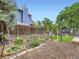Fenced backyard with a play set and garden, perfect for outdoor enjoyment at 4904 E 125Th Ave, Thornton, CO 80241