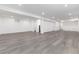 Spacious basement with gray floors and white walls at 5886 S Logan St, Centennial, CO 80121