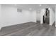 Finished basement with durable floors, recessed lighting, and staircase access to other floors at 5886 S Logan St, Centennial, CO 80121