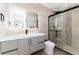 Modern bathroom featuring a vanity, walk-in shower and neutral tiling at 5886 S Logan St, Centennial, CO 80121