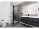 Bathroom featuring a walk-in shower and modern vanity at 5886 S Logan St, Centennial, CO 80121