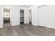 Bedroom with a closet and an open doorway to the bathroom at 5886 S Logan St, Centennial, CO 80121