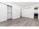 Bright bedroom featuring sleek closet doors and plenty of floor space at 5886 S Logan St, Centennial, CO 80121