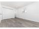 Clean, bright bedroom with a sliding closet and a window at 5886 S Logan St, Centennial, CO 80121