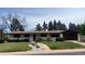 Charming single story home with well-manicured lawn and tasteful landscaping at 5886 S Logan St, Centennial, CO 80121