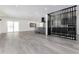 Open concept with sleek gray cabinets, stainless appliances and expansive gray flooring at 5886 S Logan St, Centennial, CO 80121
