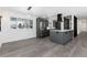 Modern kitchen with stainless steel appliances and gray cabinets at 5886 S Logan St, Centennial, CO 80121