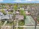 Aerial view showcasing a well-maintained neighborhood with mature trees and lush greenery at 925 S University Blvd, Denver, CO 80209