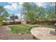 Backyard featuring a large grassy area and a stone patio, perfect for outdoor entertaining at 925 S University Blvd, Denver, CO 80209
