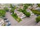 Aerial view of multi-Gathering homes showcasing landscaping, parking, and neighborhood at 2143 Coronado N Pkwy # C, Denver, CO 80229