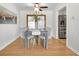 Cozy dining area featuring a modern table setting and natural light at 479 S Kendall St, Lakewood, CO 80226