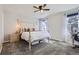 Serene bedroom featuring carpet floors, neutral walls, and natural lighting at 6333 Zang Ct # E, Arvada, CO 80004