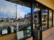 House of Coffee with large decorative window, clear signage, and inviting storefront at 6333 Zang Ct # E, Arvada, CO 80004