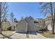 View of home shows a two-car garage and inviting front porch at 6333 Zang Ct # E, Arvada, CO 80004