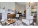 Open-concept space connects the living and dining areas, showcasing the home's comfortable and modern design at 6333 Zang Ct # E, Arvada, CO 80004