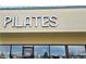 Pilates studio with large windows, clear signage, and inviting storefront at 6333 Zang Ct # E, Arvada, CO 80004