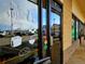 Sushi restaurant window with decorative art and visible parking area at 6333 Zang Ct # E, Arvada, CO 80004