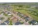 New two-story home with manicured front yard near green spaces and winding roads in a suburb at 154 Back Nine Dr, Castle Pines, CO 80108