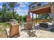 Outdoor deck complete with furnishings and a grill, perfect for entertaining at 1744 Brookside Dr, Highlands Ranch, CO 80126