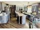 Spacious kitchen with stainless steel appliances and a breakfast bar island at 1744 Brookside Dr, Highlands Ranch, CO 80126