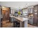 Functional kitchen featuring an island, stainless steel appliances, and ample counter space at 1744 Brookside Dr, Highlands Ranch, CO 80126
