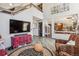Spacious living area with an open floor plan and wood-look flooring at 1744 Brookside Dr, Highlands Ranch, CO 80126