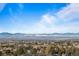 Panoramic city view showcasing distant snow-capped mountains and clear skies at 5455 Landmark Pl # 815, Greenwood Village, CO 80111