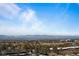 Expansive city view featuring mountain range against clear blue skies at 5455 Landmark Pl # 815, Greenwood Village, CO 80111