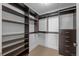 This closet is customized with shelving, drawers and hanging storage at 5455 Landmark Pl # 815, Greenwood Village, CO 80111