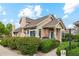 Charming, well-maintained home with mature landscaping and inviting curb appeal on a sunny day at 2164 S Troy Way, Aurora, CO 80014