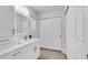 Modern bathroom featuring white cabinets and ample storage at 13631 E Marina Dr # 105, Aurora, CO 80014