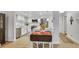 Modern kitchen with stainless appliances and an adjacent dining area at 13631 E Marina Dr # 105, Aurora, CO 80014