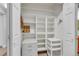 Storage area with built in shelves, cabinets and closet space for organized storage at 13631 E Marina Dr # 105, Aurora, CO 80014