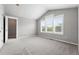 Spacious and airy bedroom with ample natural light, vaulted ceilings, and neutral carpet, perfect for relaxation at 9134 E 29Th Pl, Denver, CO 80238