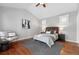 Bright bedroom with vaulted ceilings, hardwood floors and modern decor at 9134 E 29Th Pl, Denver, CO 80238
