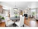 Open dining area connects to the living room, creating a seamless living space at 9134 E 29Th Pl, Denver, CO 80238