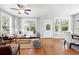 Bright living room with hardwood floors and neutral decor offers an inviting space at 9134 E 29Th Pl, Denver, CO 80238