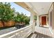 Charming patio with outdoor seating and lush landscaping, perfect for entertaining at 9134 E 29Th Pl, Denver, CO 80238