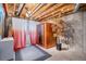 Unique basement featuring wooden beams, a sauna, and decorative touches for a spa-like atmosphere at 510 W Prestwick Way, Castle Rock, CO 80104