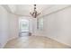 Inviting dining room with tile flooring and modern chandelier, perfect for gatherings and Gathering meals at 510 W Prestwick Way, Castle Rock, CO 80104