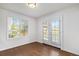 Cozy dining area featuring hardwood floors and French doors that lead to the outdoor space at 510 W Prestwick Way, Castle Rock, CO 80104